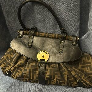 classy bag get lots of compliments but i only use one of many